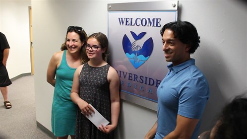 Riverside Medical held a design competition at local schools for its new logo.  11 year old Keira Treller won the competition (centre) and was on hand at the grand opening.