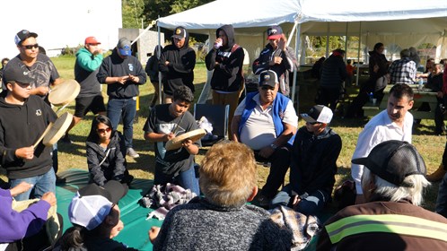 Members of Athabasca Chipewyan play hand games at their gathering.