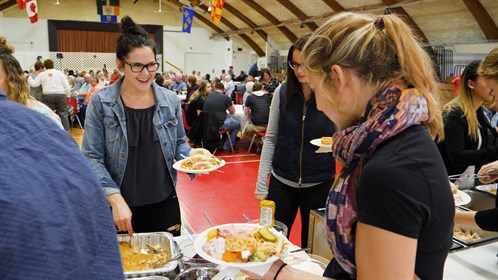 The community hosts a dinner for the students at the Milk River civic centre.