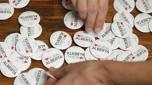 Our, I Love Rural Alberta buttons.