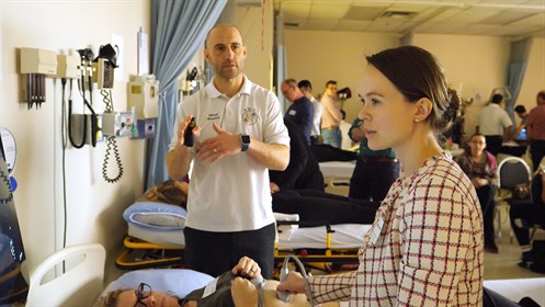 EDE Ultrasound Course Director Mark Bromley (L) instructs Dr. Elizna van der Merwe, a physician in Brooks.
