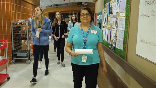 Cheryl Huxley leads students on a tour of the hospital.