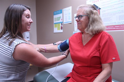 LPN Brooke Elworthy takes Valerie Holroydâs blood pressure at the Bashaw Medical Centre
